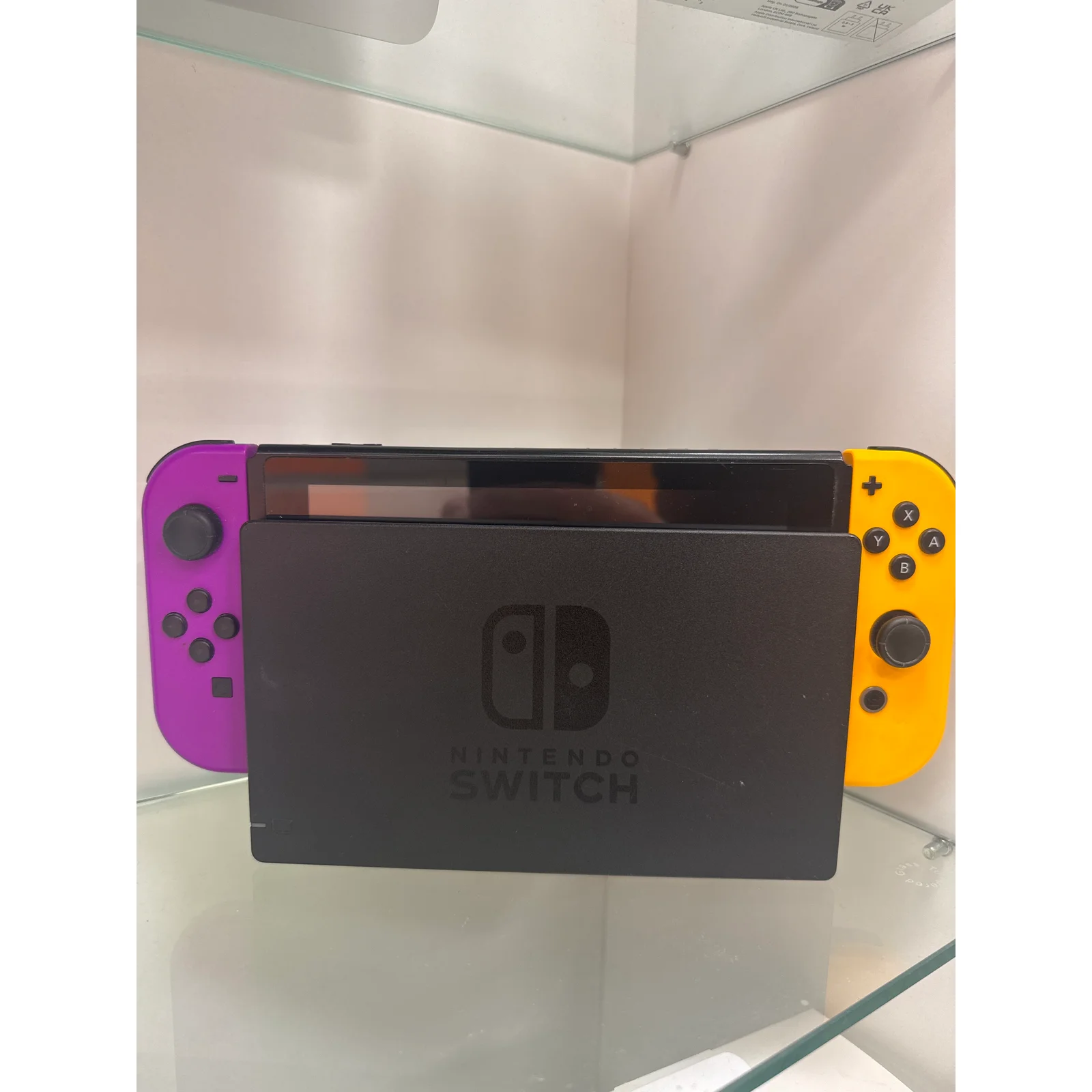 CONSOLE NINTENDO SWITCH NOIR 32GB + 2 JOYCON VIOLET NEON & ORANGE NEON